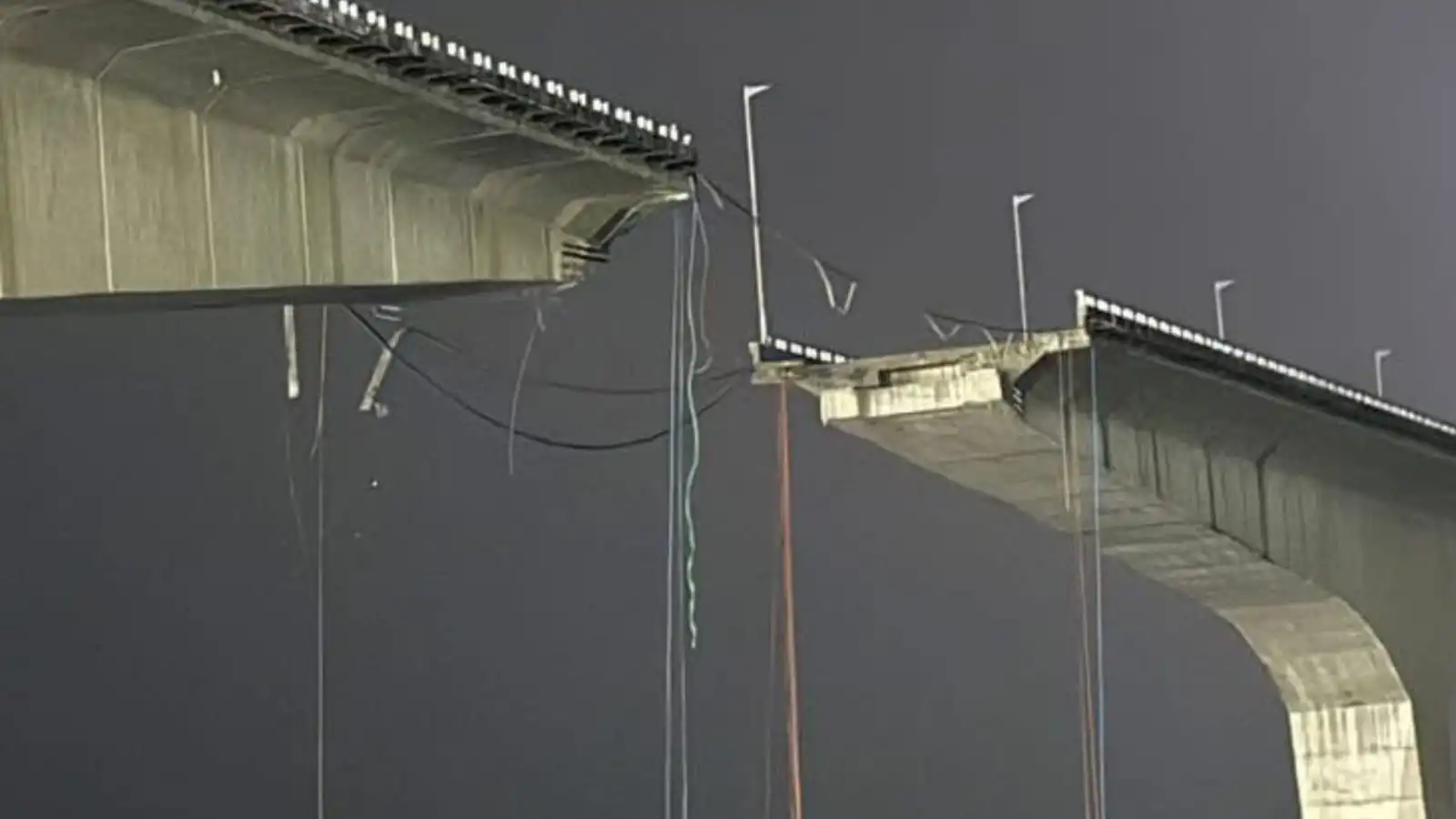 major accident averted in bhagalpur as part of vikramshila setu falls into the ganga vehicles get stranded on the bridge