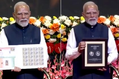 rss 100 years pm modi releases commemorative coin postage stamp