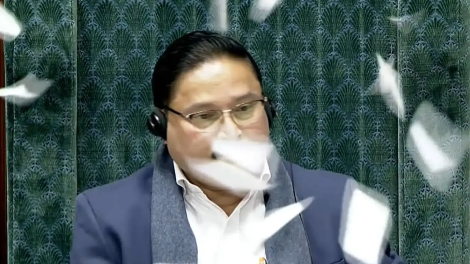 lok sabha 8 mps suspended paper throwing ruckus
