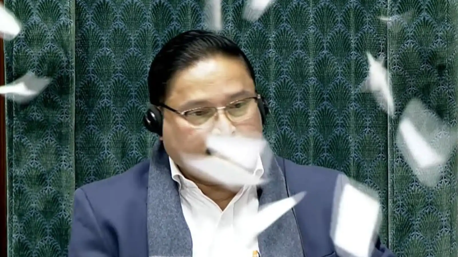 lok sabha 8 mps suspended paper throwing ruckus