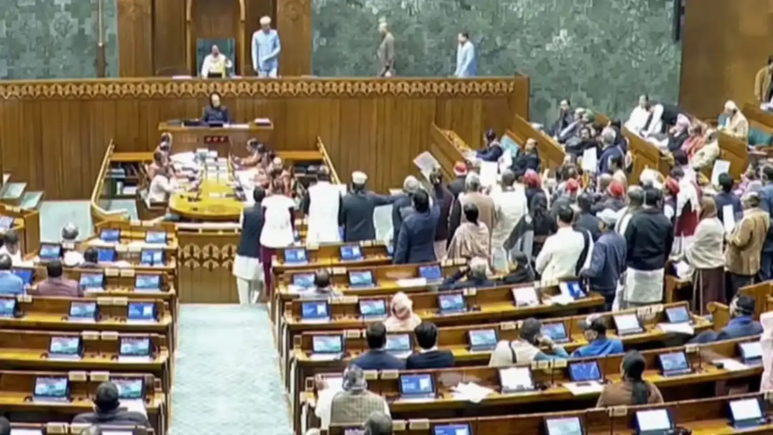 suspension of 8 mps who threw papers at the speaker revoked om birla sets conditions
